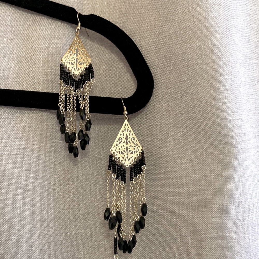 Black and silver chandelier earrings one earring missing a bead